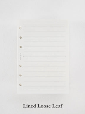 Crisp white loose leaf paper featuring uniform horizontal guidelines and three punched binder holes, ready for writing and organization.