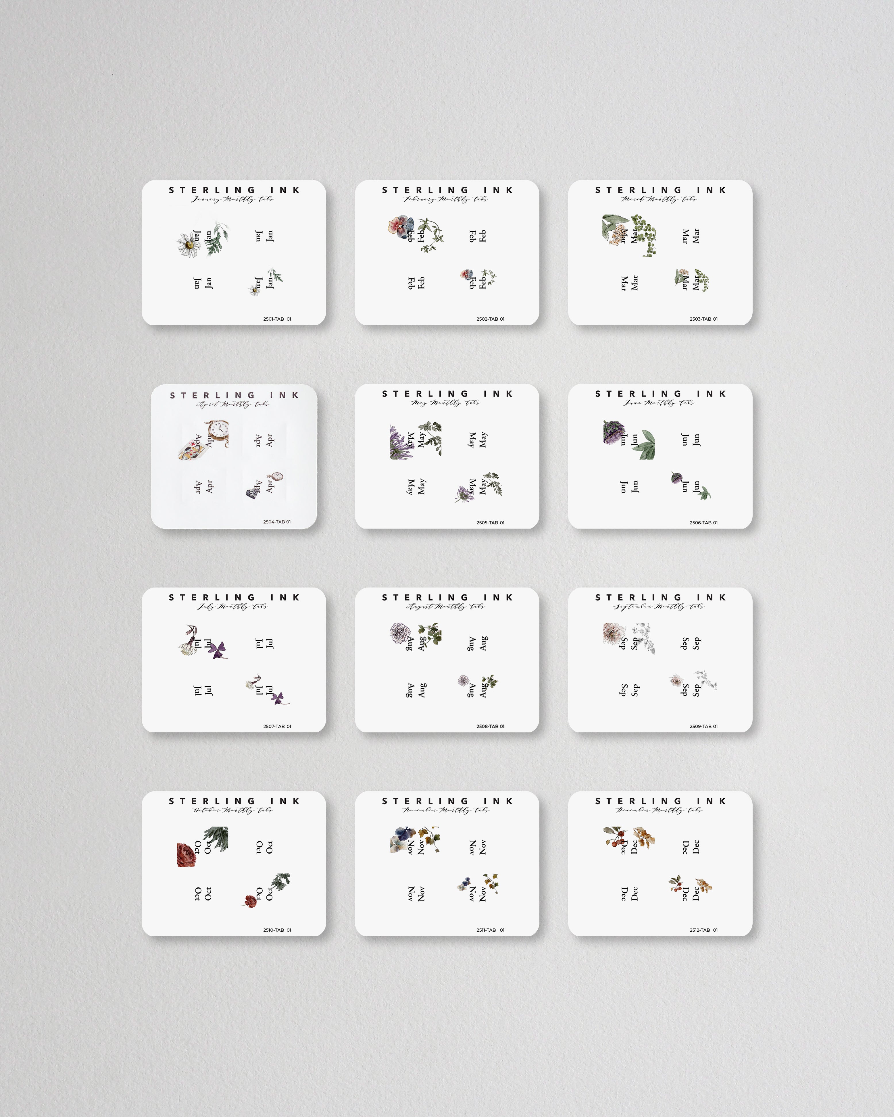 Complete monthly tab sticker set featuring whimsical seasonal illustrations and holiday themes from January to December for journaling and planners.