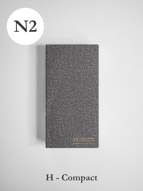 2027 N2 Horizontal Compact planner front cover in Tweed #color_tweed