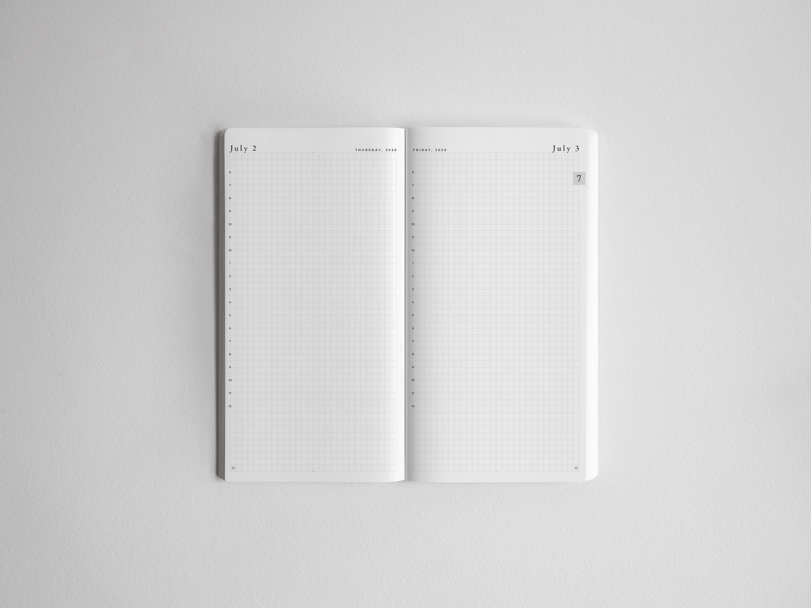 Open daily academic planner spread displaying gridded, lined pages for July 2 and July 3, ideal for organizing the full 2026-2027 school year.