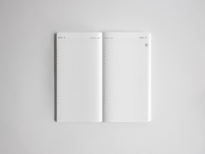 Open daily academic planner spread displaying gridded, lined pages for July 2 and July 3, ideal for organizing the full 2026-2027 school year.