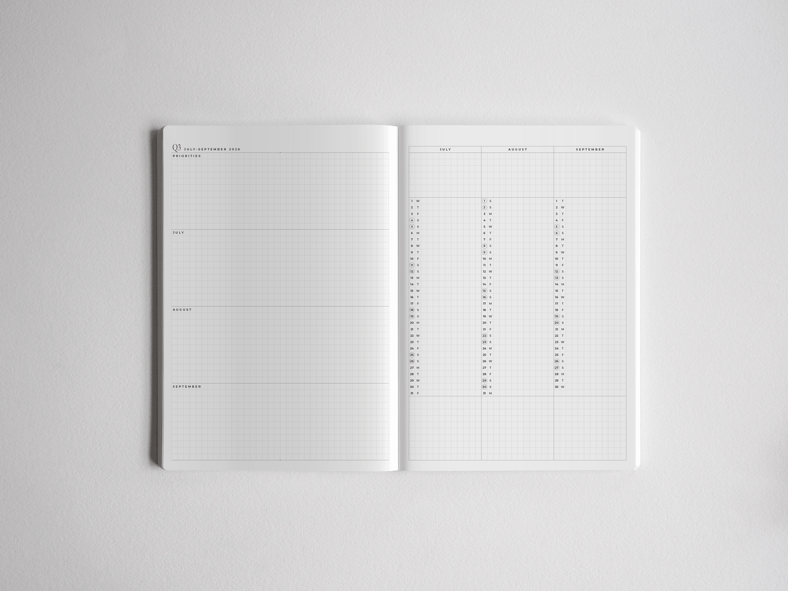 Minimalist A5 academic planner showing structured ruled monthly spreads, perfect for organizing a full year of study and schedule planning.