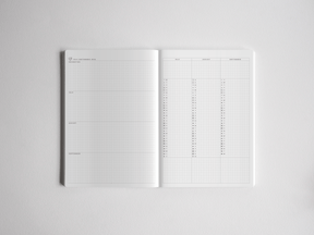 Open A5 academic planner showcasing clean, white, multi-column grids segmented for monthly organization and full-year planning for students.