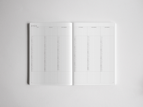 Detailed white A5 daily academic planner open to a yearly view, featuring structured monthly grids for planning the 2026–2027 school year.
