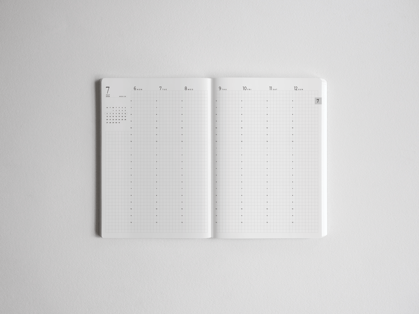 Minimalist B6 academic planner spread featuring vertical weekly layouts and numbered columns for comprehensive, full-year scheduling.