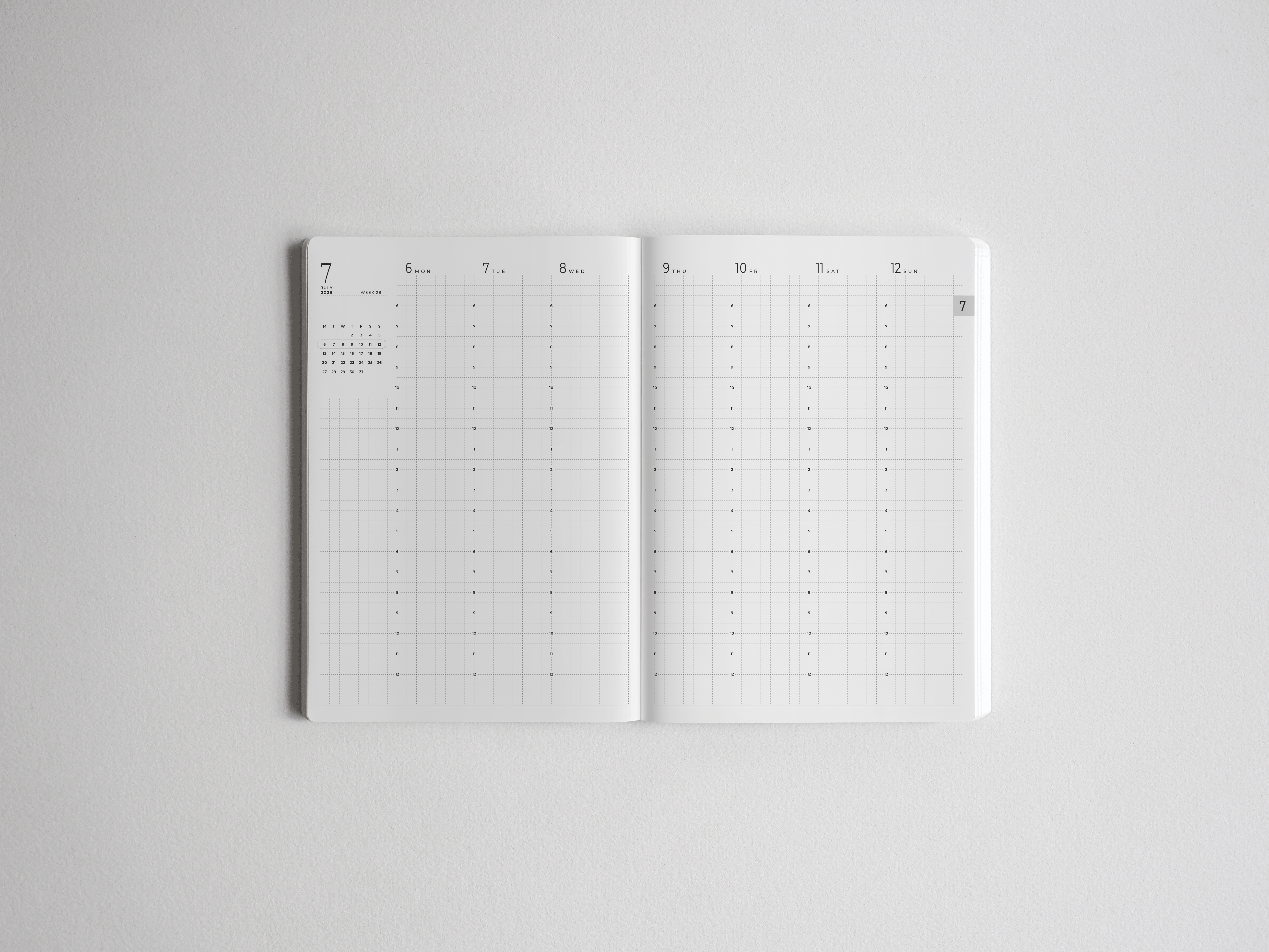 Minimalist B6 academic planner spread featuring vertical weekly layouts and numbered columns for comprehensive, full-year scheduling.