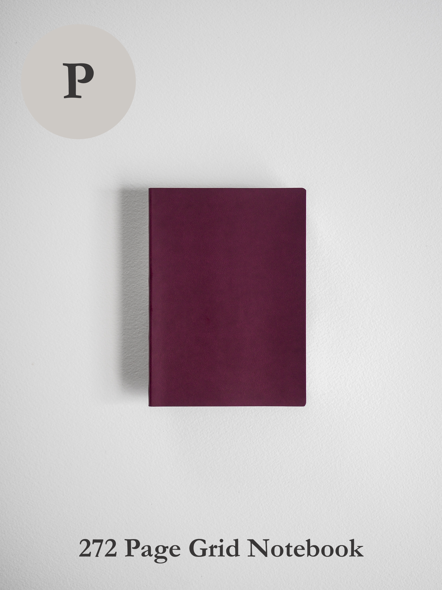 Solid, deep maroon notebook with a smooth, uniform cover, designed for writing and planning.