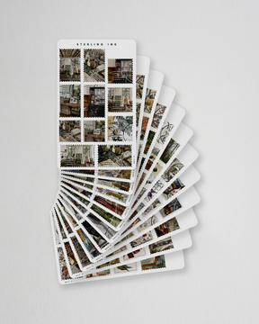 A cascaded stack of "Sterling Ink" vintage sticker sheets featuring a diverse collection of detailed black-and-white illustrations of city streets, architecture, and historical urban scenes.