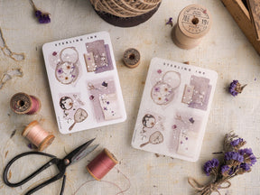 A set of illustration stickers featuring delicate spring themes, including pink and purple florals, antique jewelry designs, and elegant botanical elements.