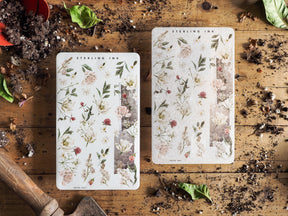 Botanical washi sticker sheets featuring delicate, cream-toned illustrations of spring flowers and foliage, perfect for seasonal crafting.