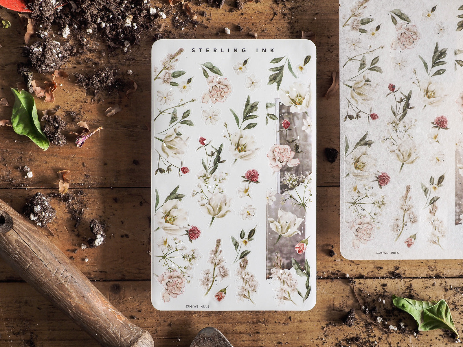 Watercolor washi sticker strip set featuring delicate spring floral designs of pale roses, peonies, and various shades of green foliage.