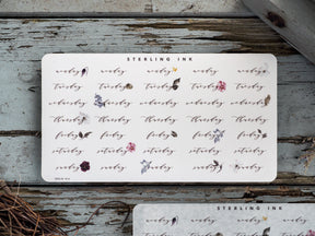 Pastel sticker sheets for April 2023, featuring the weekly days of the week and delicate, charming repeating botanical floral motifs for planning.