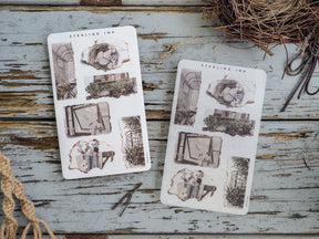 Decorative "Torn Paper Stickers" featuring vintage black-and-white illustrations of distressed architectural details, arches, and rustic windows.