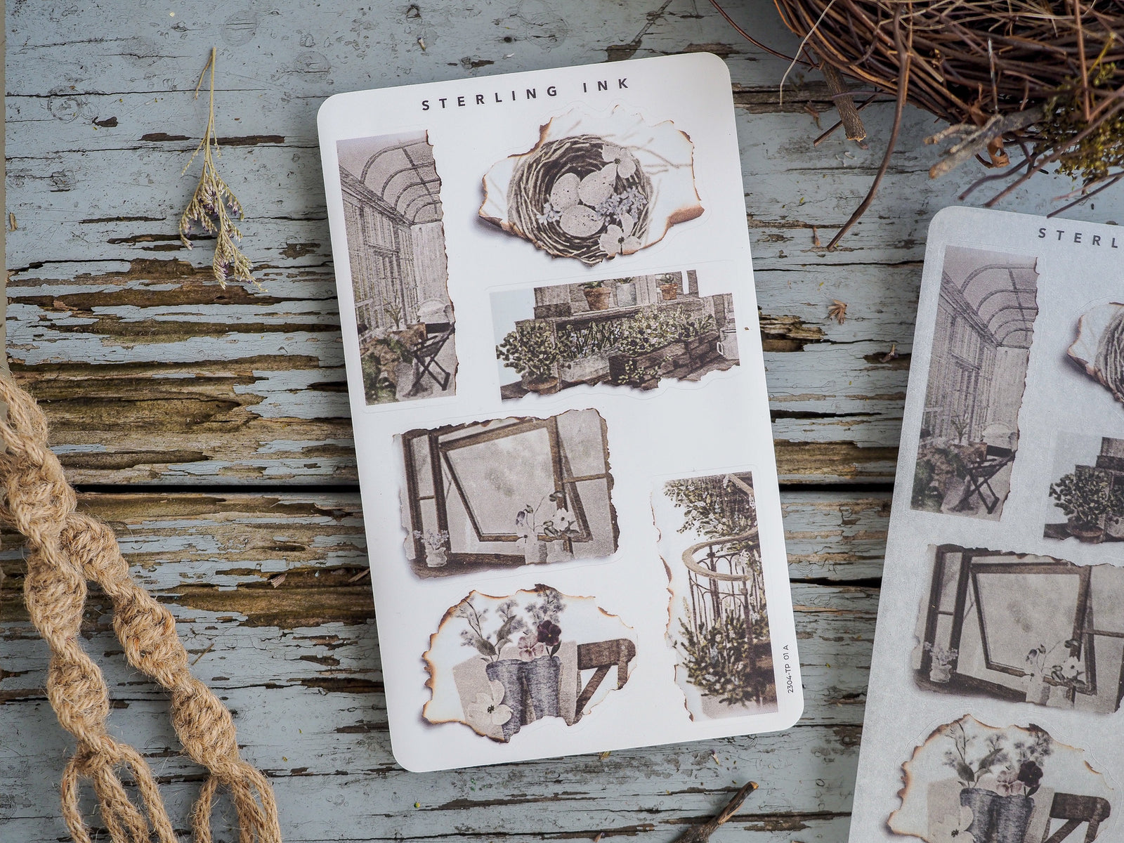 Torn paper sticker sheet featuring rustic architectural elements and botanical prints in a distressed, vintage sepia-toned style.