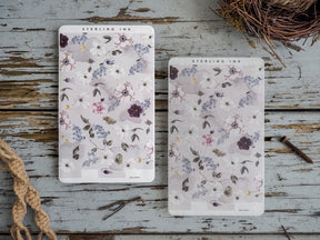 Delicate watercolor floral stickers featuring a sweet spring pattern of white, lilac, and lavender blossoms perfect for journaling.