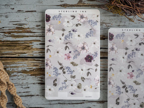 Thin strip stickers featuring soft, muted watercolor florals, including pink, blue, and lavender blossoms perfect for a delicate spring and botanical theme.
