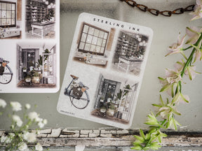 Detailed sticker set featuring vintage black and white illustrations of European street scenes, storefront windows, and architectural details.