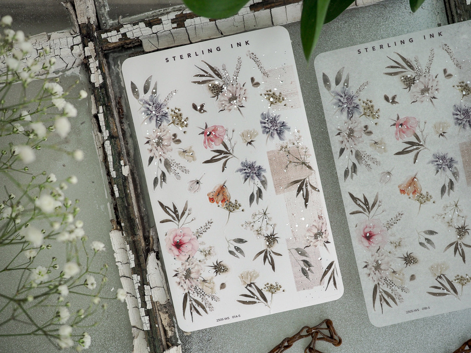 Romantic botanical washi stickers featuring clusters of soft blush pink roses, dusty lavender, and sage green foliage for scrapbooking.