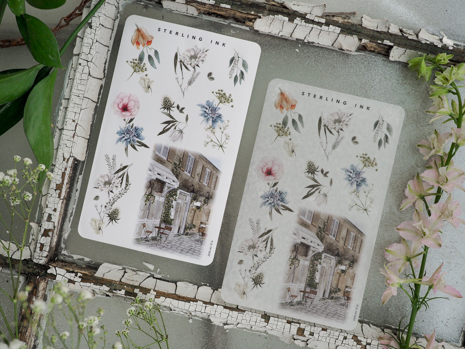 Botanical sticker sheets featuring delicate spring bouquets, peonies, and foliage surrounding an elegant, vintage illustration of a European cobblestone street.