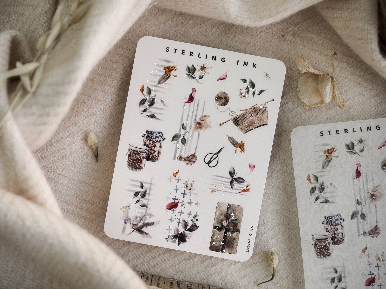 Rustic icon sticker set depicting muted watercolor illustrations of dried botanicals, mason jars, berries, and seasonal natural elements.