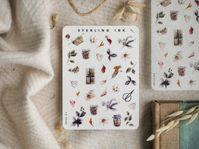 Detailed sticker sheet showcasing muted, seasonal botanical elements, including dried leaves, flower clusters, miniature apothecary jars, and rustic natural icons.
