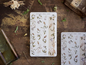 Elegant stationery strips featuring muted botanical patterns, including watercolor leaves, pale flowers, and natural earth tones.