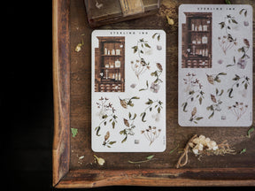 Decorative sticker set featuring botanical illustrations of dried flora and arranged herbs displayed on antique apothecary cabinet designs.