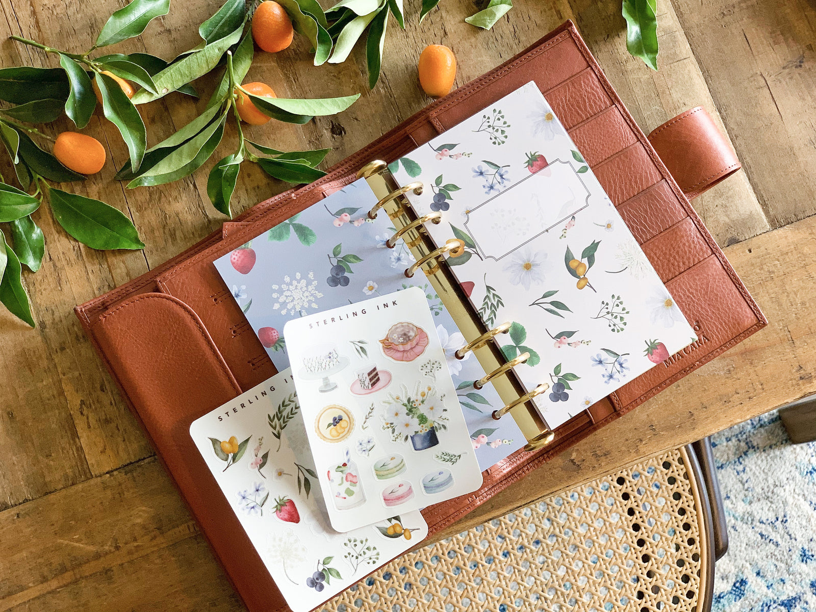 Watercolor sticker sheets featuring sweet fruit, berries, peaches, flowers, and picnic florals. Perfect for crafting.