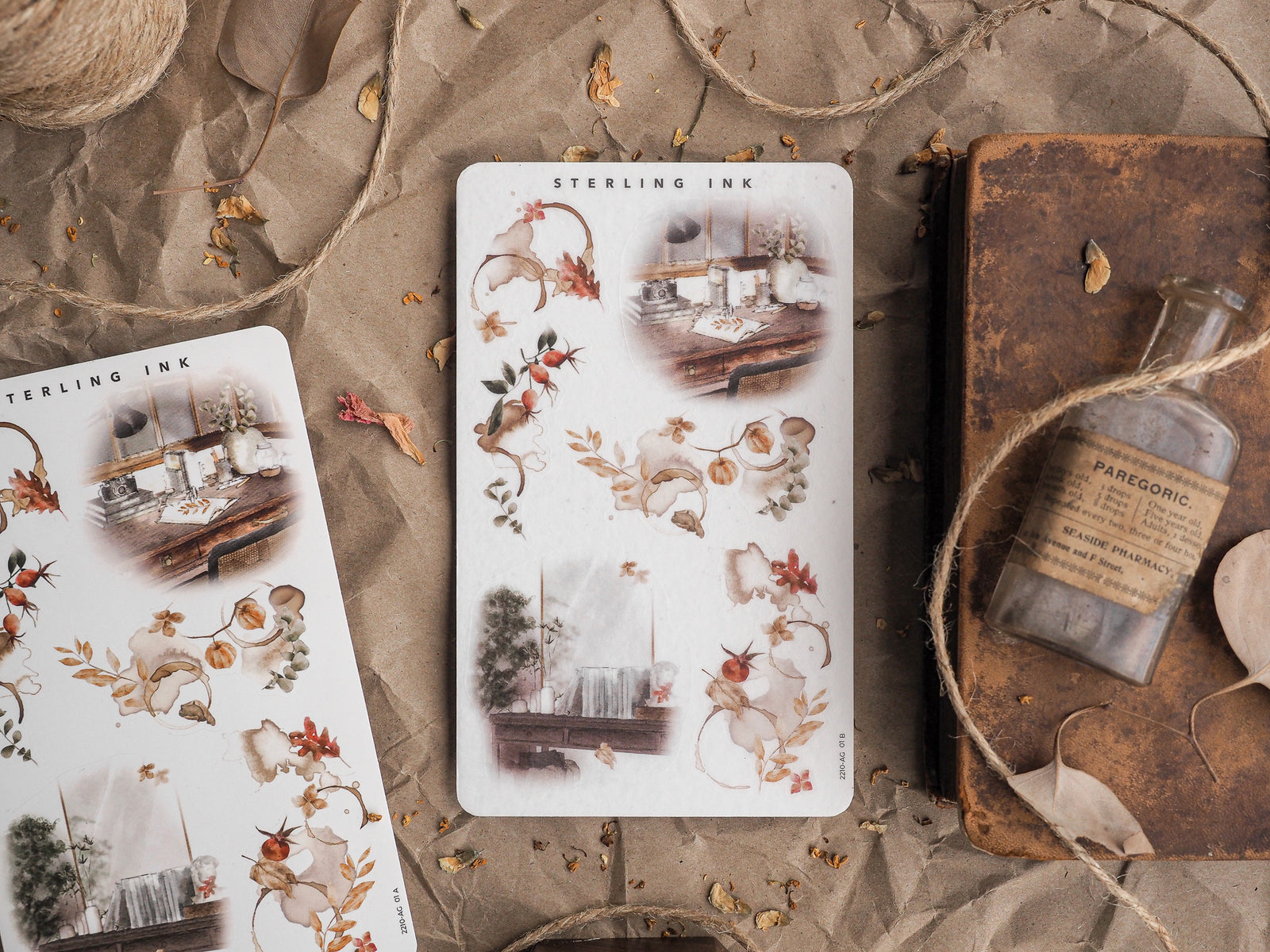 Autumnal sticker sheet set featuring rustic botanicals, dried floral arrangements, and vintage apothecary vignettes in warm reds and deep browns.
