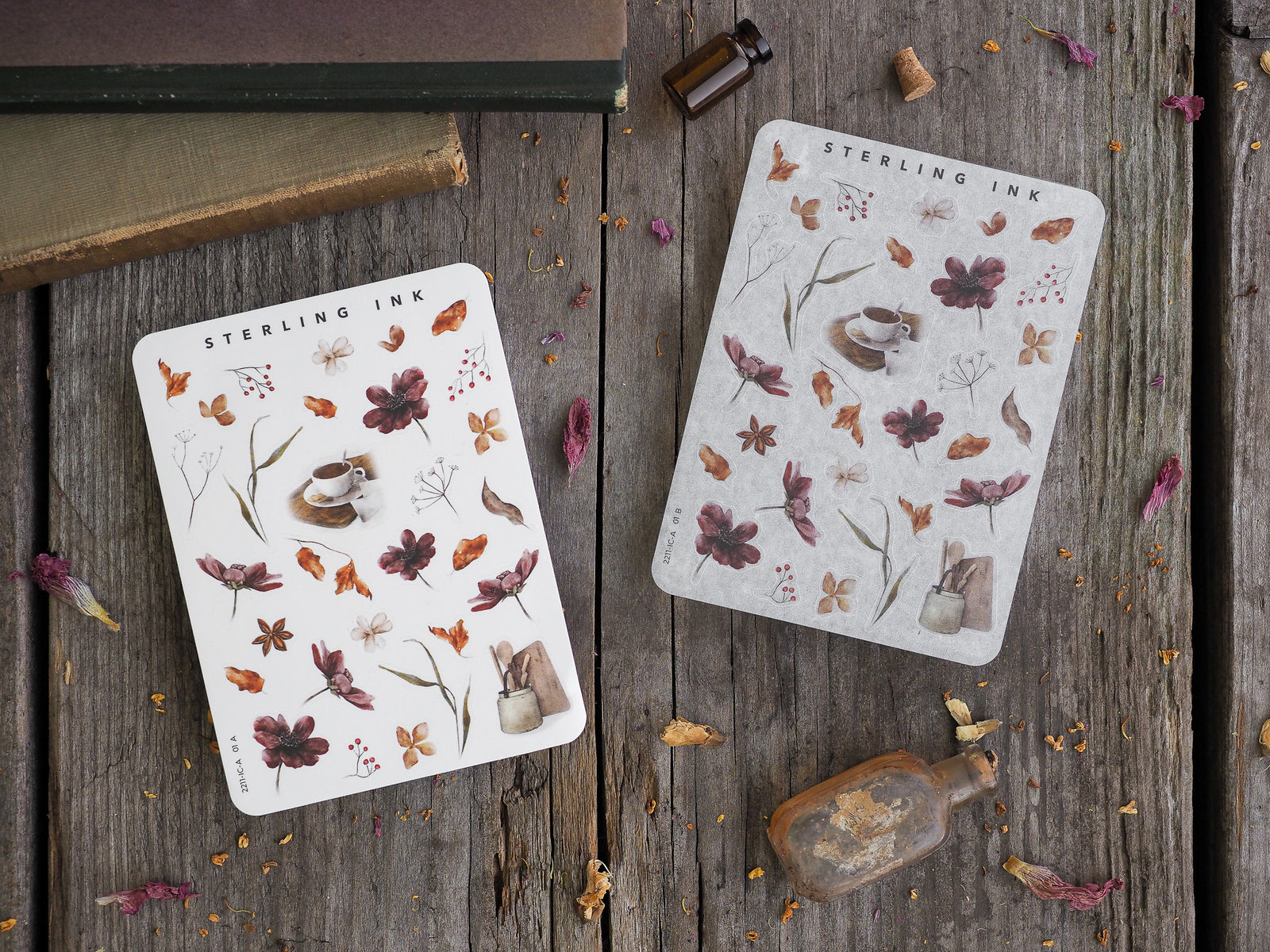 Mini sticker sheets featuring delicate autumn botanical icons, including russet leaves, small berries, and dried flowers, set against a creamy background.