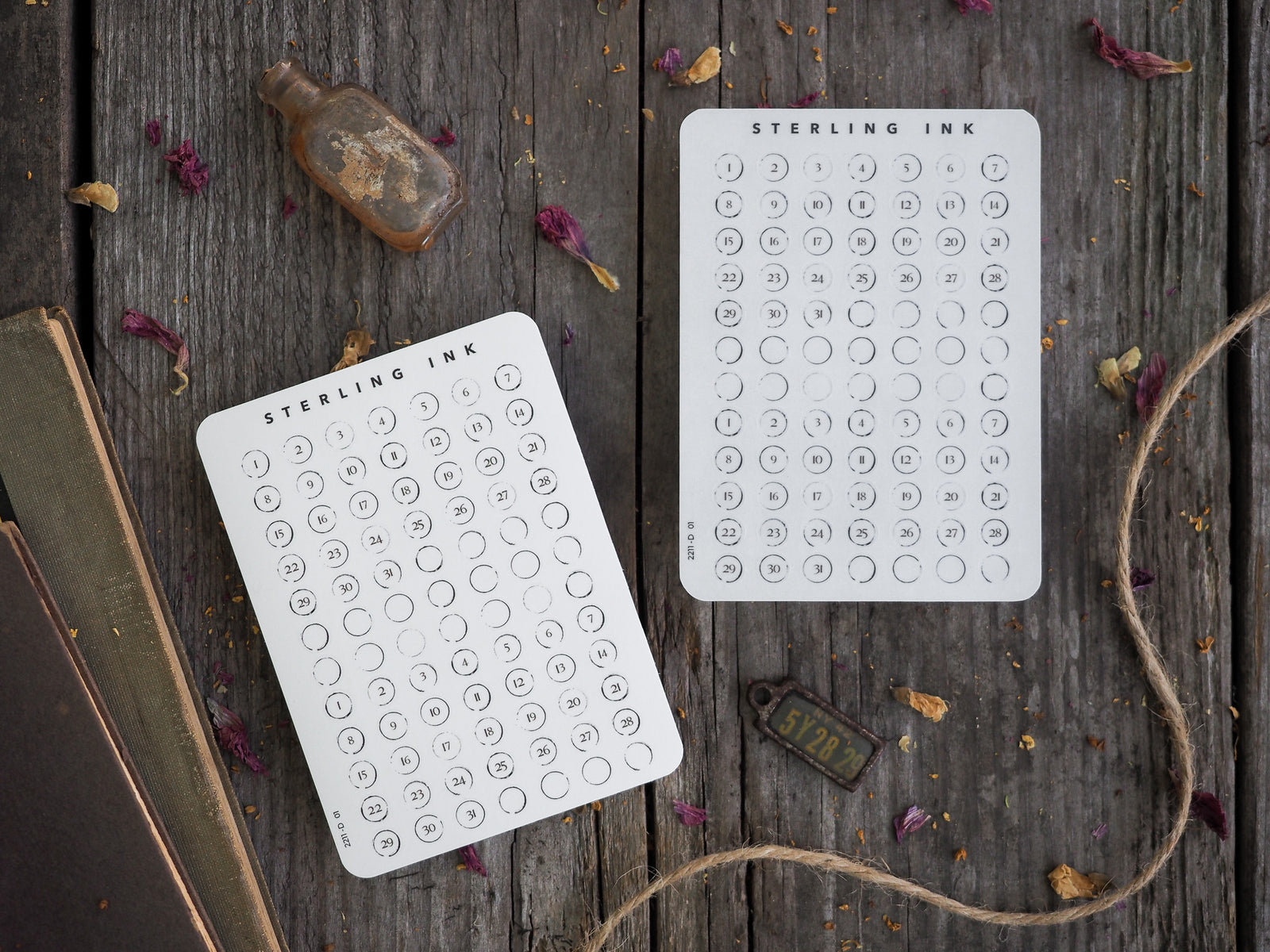 White circular date stickers featuring the November 2022 calendar layout with clean, classic numerical design and 'Sterling Ink' branding.