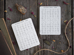 White circular date stickers featuring the November 2022 calendar layout with clean, classic numerical design and 'Sterling Ink' branding.
